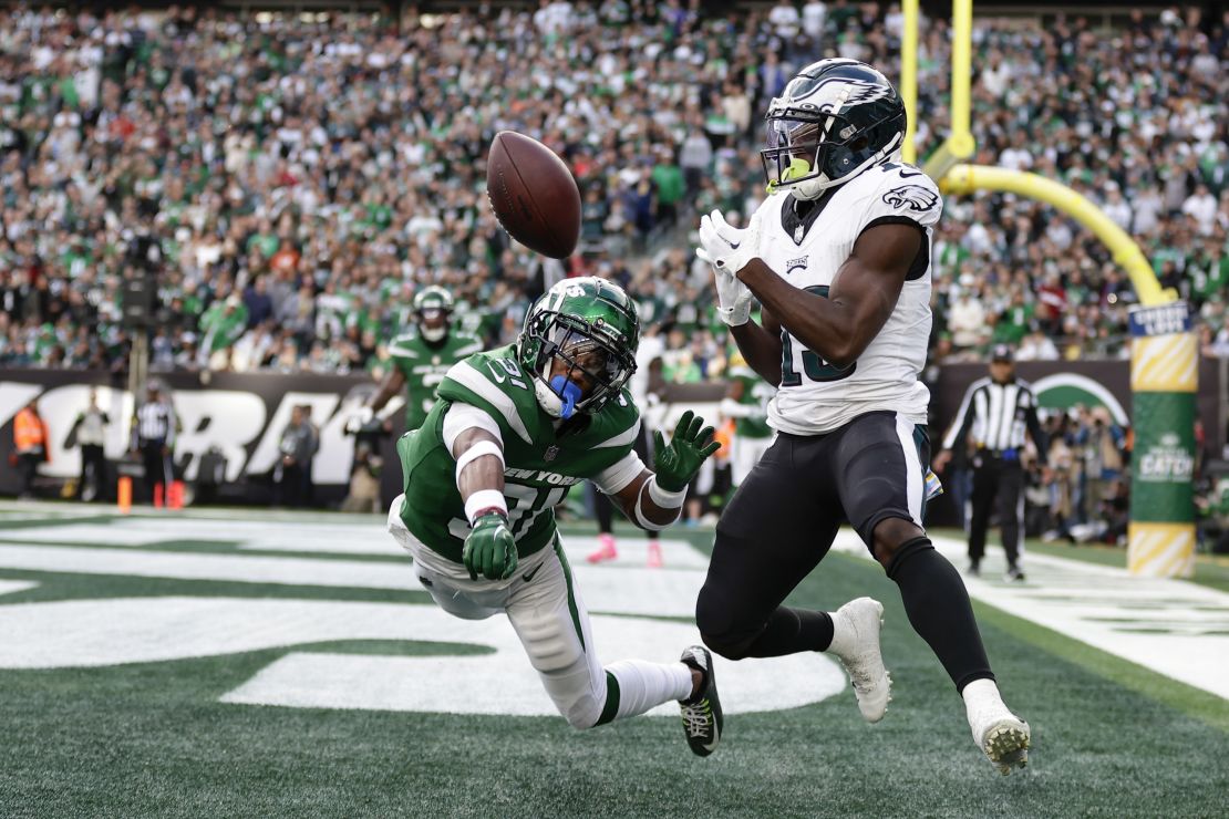 New York Jets' Craig James, left, breaks up a pass intended for Philadelphia Eagles' Olamide Zaccheaus during the first half of an NFL football game, Sunday, Oct. 15, 2023, in East Rutherford, N.J. (AP Photo/Adam Hunger)