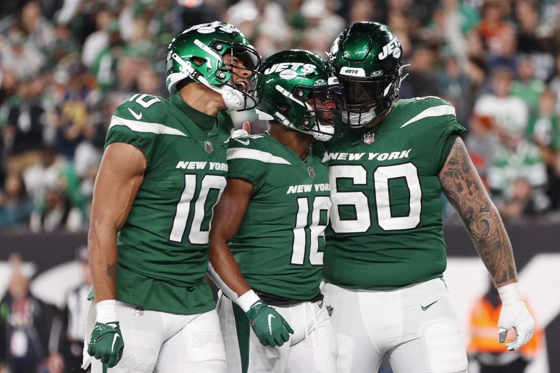 EAST RUTHERFORD, NEW JERSEY - OCTOBER 15: Randall Cobb #18 of the New York Jets celebrates after a two point conversion with Allen Lazard #10 and Connor McGovern #60 during the fourth quarter in the game against the Philadelphia Eagles at MetLife Stadium on October 15, 2023 in East Rutherford, New Jersey. (Photo by Sarah Stier/Getty Images)