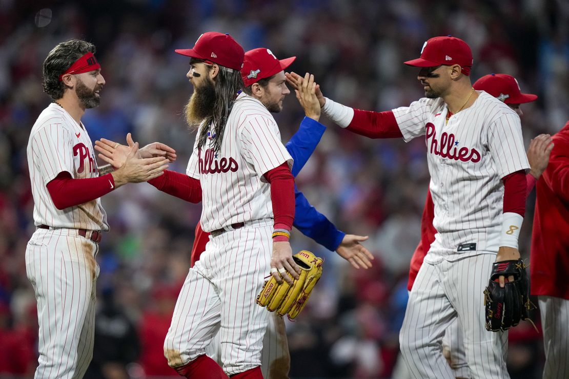 The Philadelphia Phillies celebrate their win against the Arizona Diamondbacks in Game 2 of the baseball NL Championship Series in Philadelphia, Tuesday, Oct. 17, 2023. The Phillies won 10-0 to take a 2-0 lead in the series. (AP Photo/Matt Slocum)