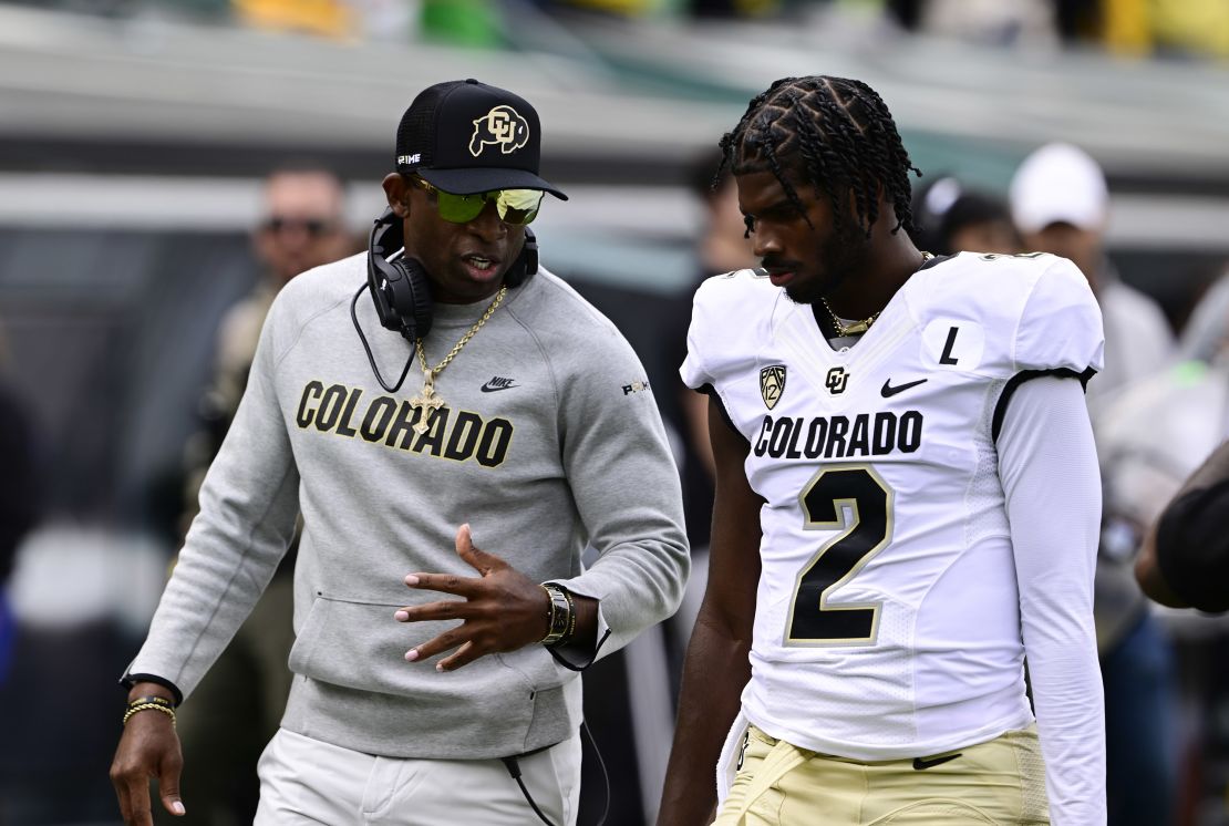 EUGENE, OR - SEPTEMBER 23: Colorado Buffaloes head coach Deion Sanders talks with his son QB Shedeur Sanders before the game against the Oregon Ducks at Autzen Stadium September 23, 2023. (Photo by Andy Cross/MediaNews Group/The Denver Post via Getty Images)