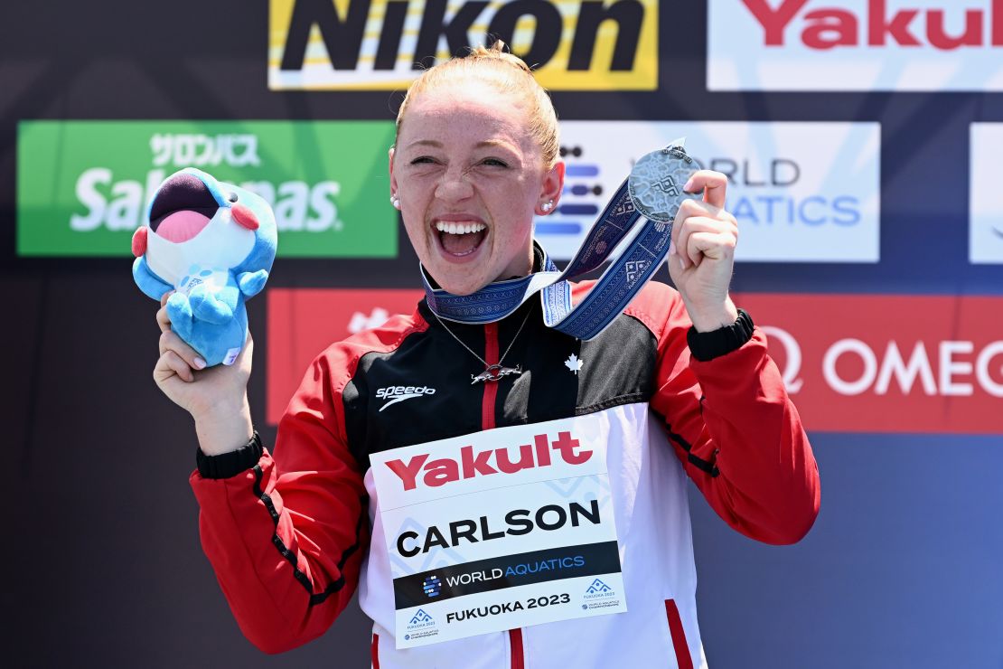 Silver medalist Molly Carlson of Team Canada celebrates during the medal ceremony for the Women's High Diving on day two of the Fukuoka 2023 World Aquatics Championships at Seaside Momochi Beach Park on July 26, 2023 in Fukuoka, Japan.