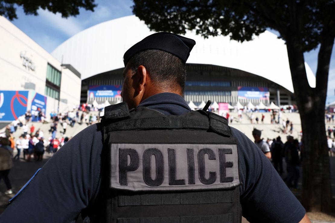 Rugby Union - Rugby World Cup 2023 - Quarter Final - England v Fiji - Orange Velodrome, Marseille, France - October 15, 2023
A police officer is seen outside the stadium before the match REUTERS/Stephanie Lecocq