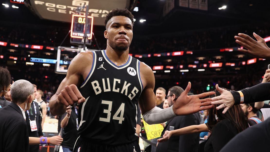 PHOENIX, ARIZONA - MARCH 14: Giannis Antetokounmpo #34 of the Milwaukee Bucks high fives fans following the NBA game against the Phoenix Suns at Footprint Center on March 14, 2023 in Phoenix, Arizona.  The Bucks defeated the Suns 116-104. NOTE TO USER: User expressly acknowledges and agrees that, by downloading and or using this photograph, User is consenting to the terms and conditions of the Getty Images License Agreement.  (Photo by Christian Petersen/Getty Images)