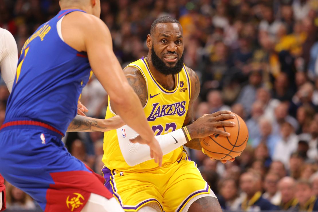 DENVER, COLORADO - OCTOBER 24: LeBron James #23 of the Los Angeles Lakers dribbles the ball up the court in the first half of the NBA Opening night game against the Denver Nuggets at Ball Arena on October 24, 2023 in Denver, Colorado. NOTE TO USER: User expressly acknowledges and agrees that, by downloading and/or using this Photograph, user is consenting to the terms and conditions of the Getty Images License Agreement. (Photo by Justin Tafoya/Getty Images)