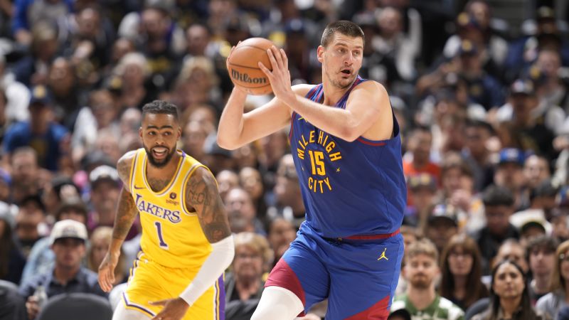 Nikola Jokić leads Denver Nuggets to victory over LA Lakers as title defense begins on NBA Opening Night