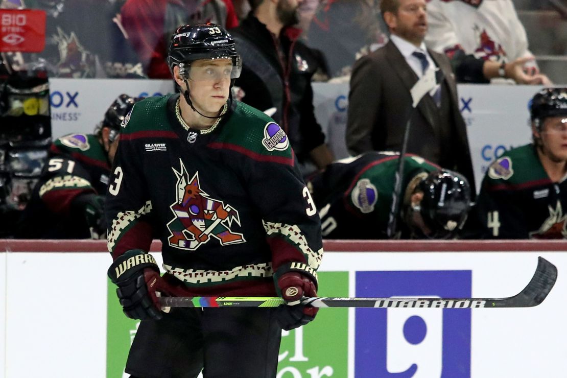 TEMPE, ARIZONA - OCTOBER 21: Travis Dermott #33 of the Arizona Coyotes skates on the ice with pride tape at Mullett Arena on October 21, 2023 in Tempe, Arizona. (Photo by Zac BonDurant/Getty Images)