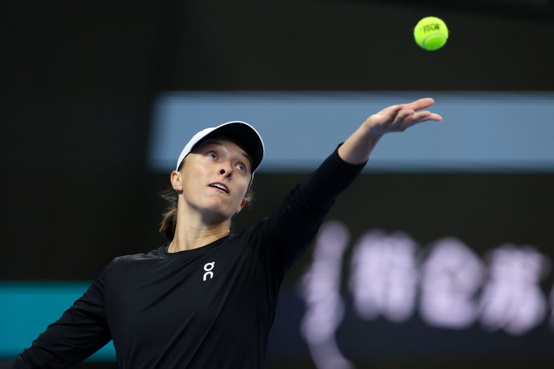 BEIJING, CHINA - OCTOBER 08: Iga Swiatek of Poland serves during the Women's Singles final match against Liudmila Samsonova day 13 of the 2023 China Open at National Tennis Center on October 08, 2023 in Beijing, China. (Photo by Emmanuel Wong/Getty Images)