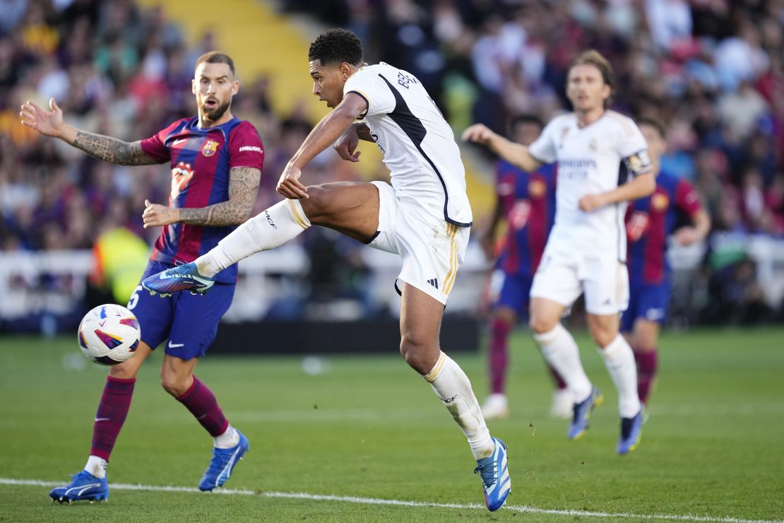 Jude Bellingham central midfield of Real Madrid and England shooting to goal during the LaLiga EA Sports match between FC Barcelona and Real Madrid CF at Estadi Olimpic Lluis Companys on October 28, 2023 in Barcelona, Spain. (Photo by Jose Breton/Pics Action/NurPhoto via Getty Images)