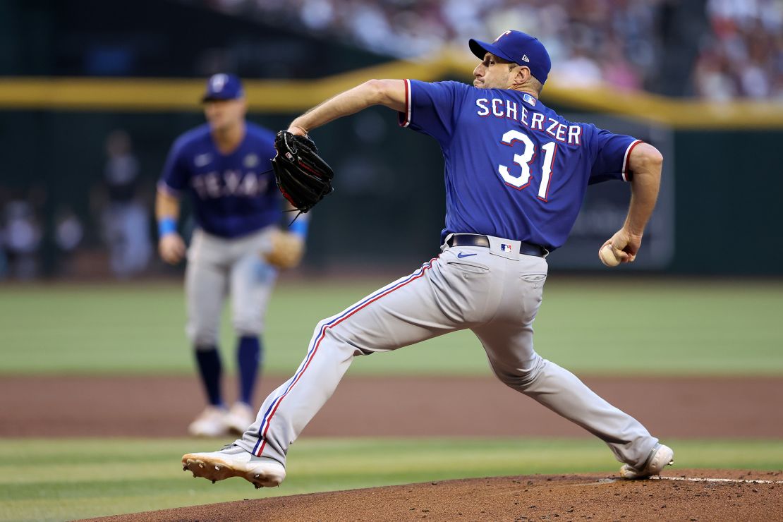 PHOENIX, ARIZONA - OCTOBER 30: Max Scherzer #31 of the Texas Rangers pitches in the first inning against the Arizona Diamondbacks during Game Three of the World Series at Chase Field on October 30, 2023 in Phoenix, Arizona. (Photo by Christian Petersen/Getty Images)