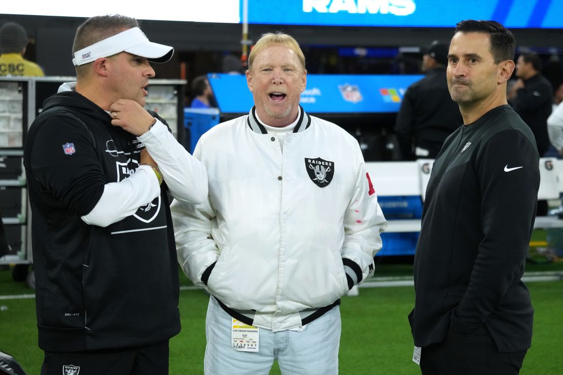 Dec 8, 2022; Inglewood, California, USA; Las Vegas Raiders coach Josh McDaniels (left), owner Mark Davis (center) and general manager Dave Ziegler talk before the game against the Los Angeles Rams at SoFi Stadium. Mandatory Credit: Kirby Lee-USA TODAY Sports