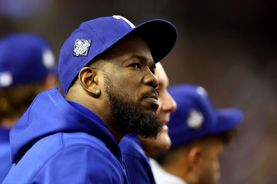 Oct 31, 2023; Phoenix, Arizona, USA; Texas Rangers right fielder Adolis Garcia (53) watches the game from the dug out during the fifth inning against the Arizona Diamondbacks in game four of the 2023 World Series at Chase Field. Mandatory Credit: Mark J. Rebilas-USA TODAY Sports