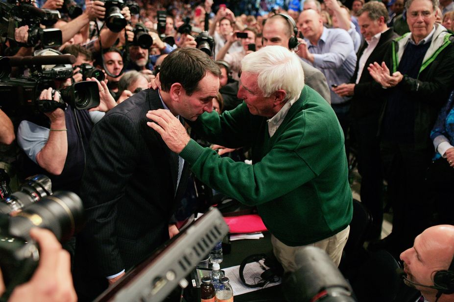 Mike Krzyzewski and Knight embrace after Krzyzewski broke Knight's record for most Division I coaching wins in 2011. Knight was at the game serving as a television commentator. Krzyzewski played point guard for Knight at Army and later served as his assistant at Indiana.