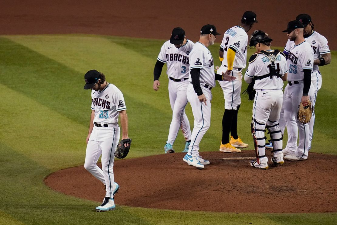 Arizona Diamondbacks starting pitcher Zac Gallen (23) leaves the mound after being pulled during the seventh inning in Game 5 of the baseball World Series against the Texas Rangers Wednesday, Nov. 1, 2023, in Phoenix. (