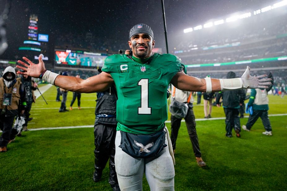 Philadelphia Eagles quarterback Jalen Hurts celebrates after scoring the game winning touchdown against the Buffalo Bills in overtime on Sunday, November 26, in Philadelphia. The Eagles won 37-34.