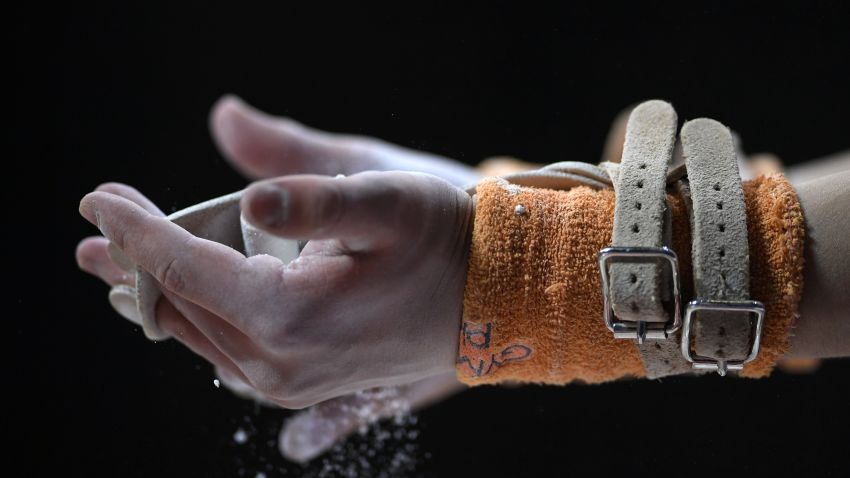 LIVERPOOL, ENGLAND - MARCH 09:  Gymnasts chalk their hands during The Women's Junior All-Around Subdivision 1 Round during the Gymnastics British Championships at Echo Arena on March 9, 2018 in Liverpool, England.  (Photo by Laurence Griffiths/Getty Images)