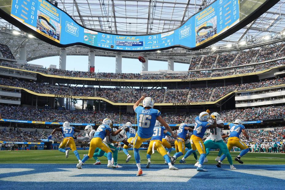 Los Angeles Chargers kicker JK Scott punts the ball against the Miami Dolphins in the second half at SoFi Stadium. The Chargers would lose 36-34 to the Dolphins.