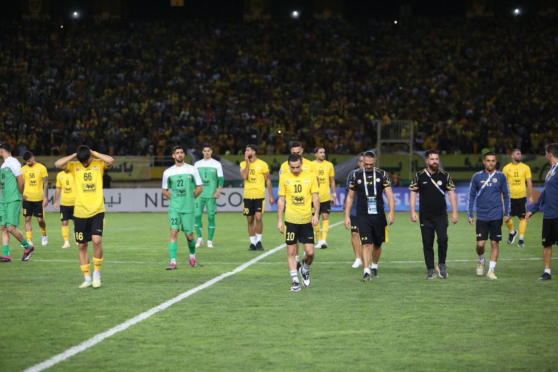 A picture obtained by AFP from the Iranian news agency Tasnim on October 2, 2023, shows Sepahan leaving the pitch after the cancellation of the AFC Champions League Group C football match between Iran's Sepahan and Saudi Arabia's Al-Ittihad at the Naghsh-e-Jahan Stadium in Isfahan. The match set to take place in the Iranian city of Isfahan "has been cancelled due to unanticipated and unforeseen circumstances", the AFC Champions League said in a statement, without elaborating. However an official with Saudi side Al Ittihad said a dispute arose after club administrators objected to a bust of slain Revolutionary Guards commander Qasem Soleimani. (Photo by MORTEZA SALEHI / AFP) (Photo by MORTEZA SALEHI/AFP via Getty Images)