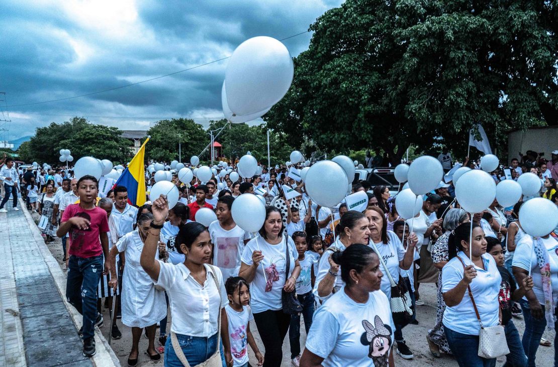 People march during a demonstration for Liverpool's Colombian football player Luis Diaz's father after he was kidnapped, in Barrancas, La Guajira, Colombia on October 31, 2023. A massive search is under way for Liverpool winger Luis Diaz's father, kidnapped in Colombia October 28, 2023 along with his wife, who has since been released. (Photo by Lismari Machado / AFP) (Photo by LISMARI MACHADO/AFP via Getty Images)