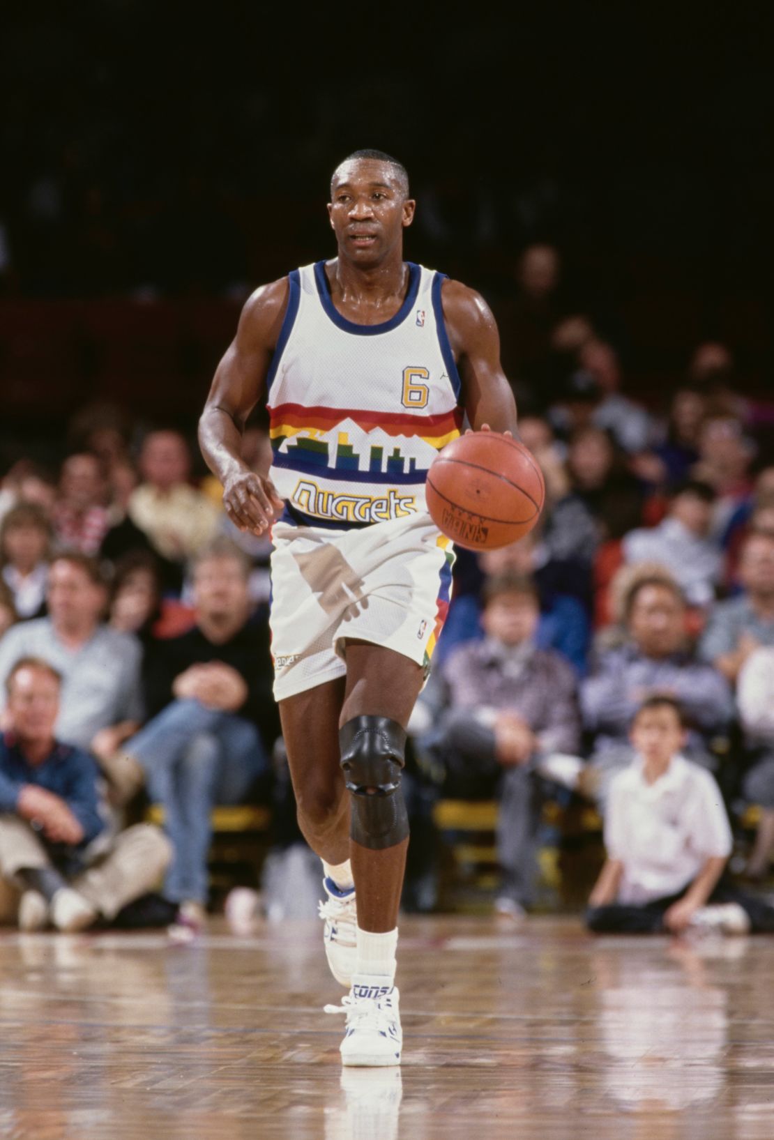 Walter Davis #6, Shooting Guard and Small Forward for the Denver Nuggets dribbles the basketball during the NBA Midwest Division basketball game against the Minnesota Timberwolves on 31st March 1992 at the McNichols Sports Arena in Denver, Colorado, United States. The Timberwolves won the game 121 - 114.  (Photo by Tim DeFrisco/Allsport/Getty Images)