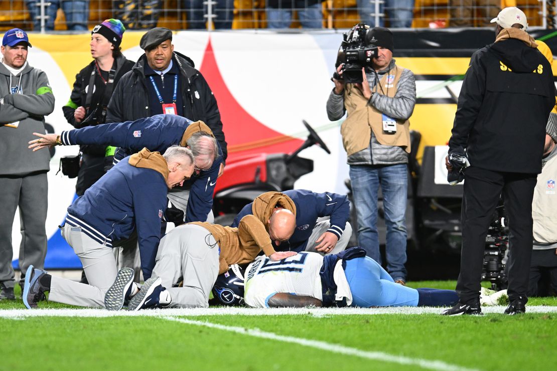 PITTSBURGH, PENNSYLVANIA - NOVEMBER 02: Treylon Burks #16 of the Tennessee Titans is checked by medical staff after a fall in the fourth quarter against the Pittsburgh Steelers at Acrisure Stadium on November 02, 2023 in Pittsburgh, Pennsylvania. (Photo by Joe Sargent/Getty Images)