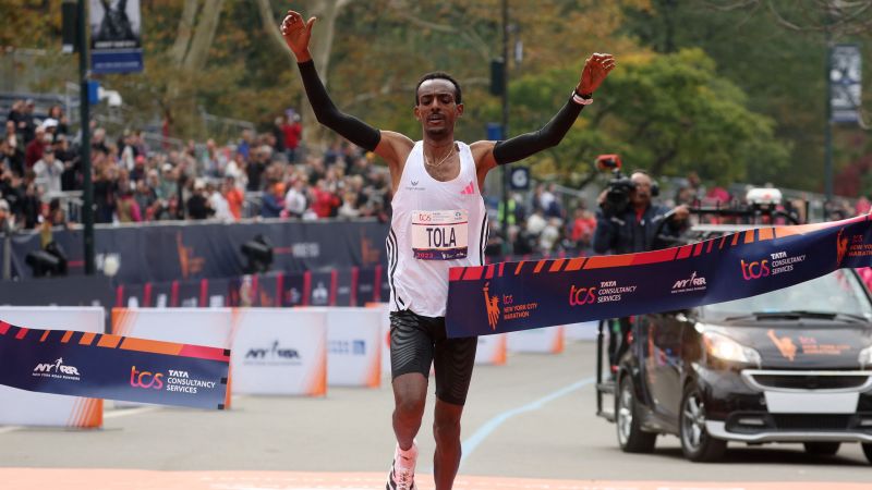 NYC Marathon: Tamirat Tola sets course record in men’s race