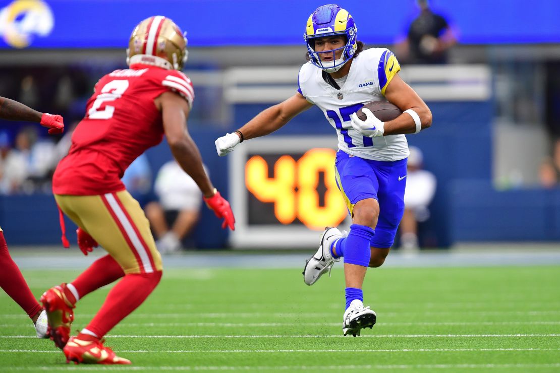 Sep 17, 2023; Inglewood, California, USA; Los Angeles Rams wide receiver Puka Nacua (17) runs the ball against San Francisco 49ers cornerback Deommodore Lenoir (2) during the first half at SoFi Stadium.