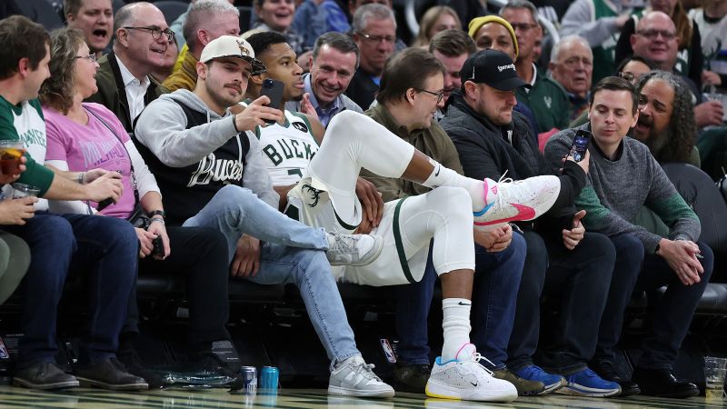 Giannis Antetokounmpo takes courtside seat after being ejected for a controversial technical foul in Bucks win