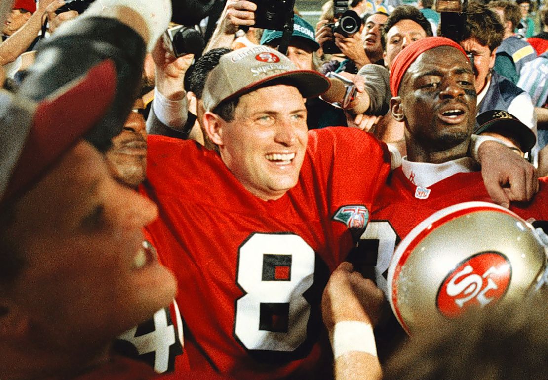 Steve Young celebrates with his team after the San Francisco 49ers won Super Bowl XXIX against the San Diego Chargers  on Jan. 29, 1995, at Joe Robbie Stadium.  (Dino Vournas/Bay Area News Group) (Photo by MediaNews Group/Daily Review via Getty Images)