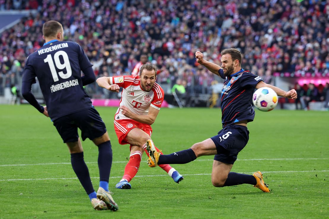 MUNICH, GERMANY - NOVEMBER 11: Harry Kane of Bayern Munich scores the team's first goal during the Bundesliga match between FC Bayern München and 1. FC Heidenheim 1846 at Allianz Arena on November 11, 2023 in Munich, Germany. (Photo by Alexander Hassenstein/Getty Images)