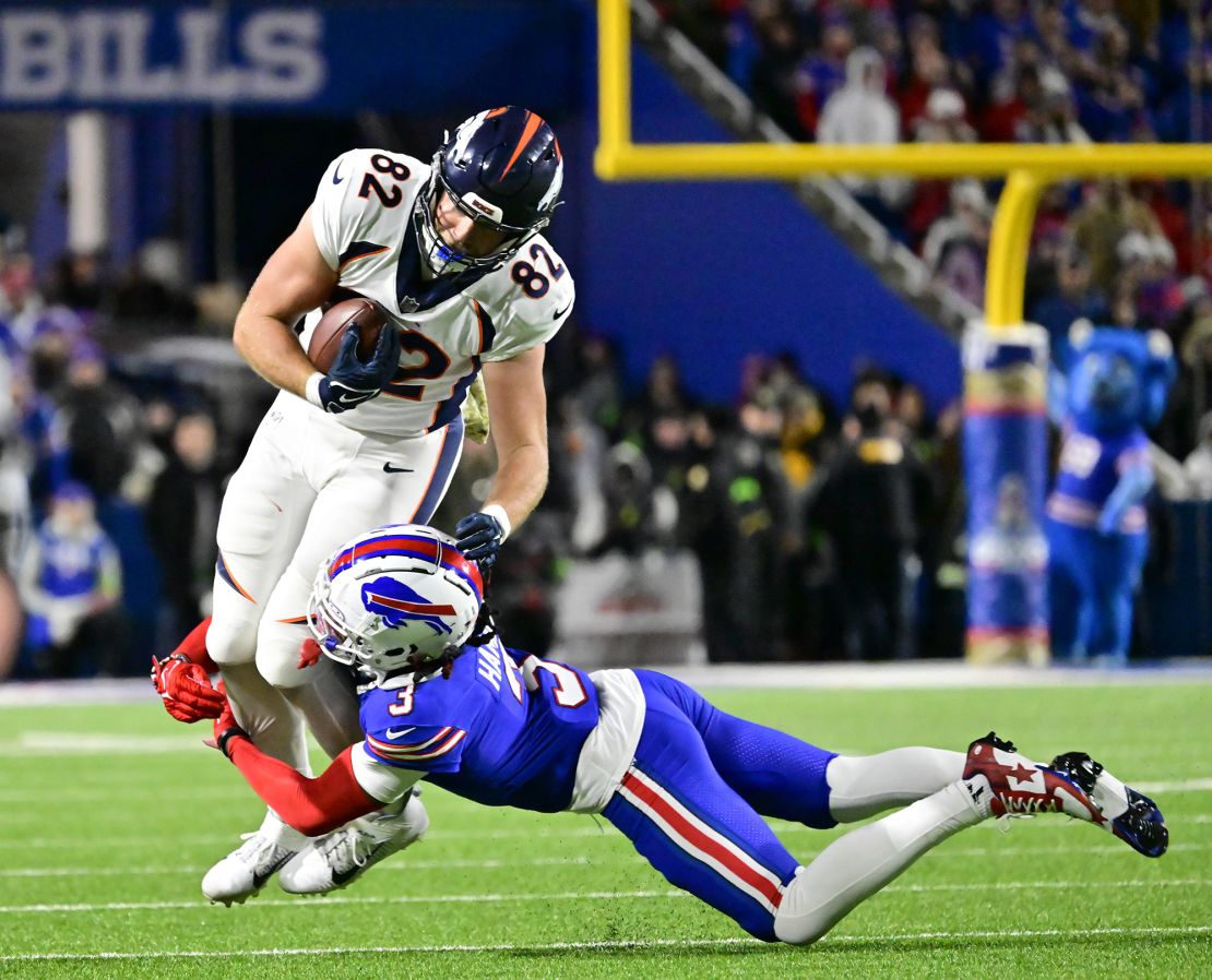 ORCHARD PARK, NY - NOVEMBER 13: Buffalo Bills safety Damar Hamlin (3) tackles Denver Broncos tight end Adam Trautman (82) after a catch in the fourth quarter at Highmark Stadium November 13, 2023. (Photo by Andy Cross/MediaNews Group/The Denver Post via Getty Images)