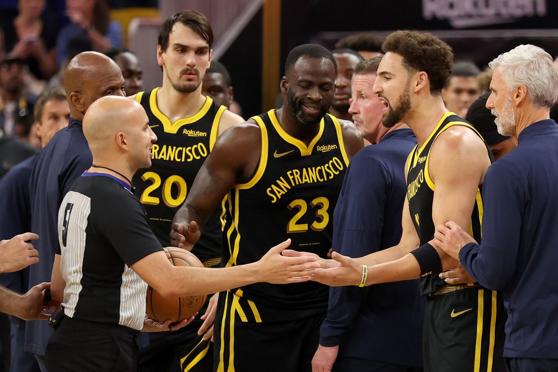 SAN FRANCISCO, CALIFORNIA - NOVEMBER 14: Klay Thompson #11 and Draymond Green #23 of the Golden State Warriors complain to the referee after getting into an altercation with the Minnesota Timberwolves at Chase Center on November 14, 2023 in San Francisco, California. NOTE TO USER: User expressly acknowledges and agrees that, by downloading and or using this photograph, User is consenting to the terms and conditions of the Getty Images License Agreement.  (Photo by Ezra Shaw/Getty Images)