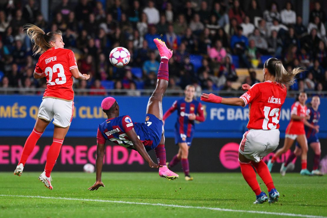 BARCELONA, SPAIN - NOVEMBER 14: Asisat Oshoala of FC Barcelona scores the team's fifth goal during the UEFA Women's Champions League group stage match between FC Barcelona and SL Benfica at Estadi Johan Cruyff on November 14, 2023 in Barcelona, Spain. (Photo by David Ramos/Getty Images)