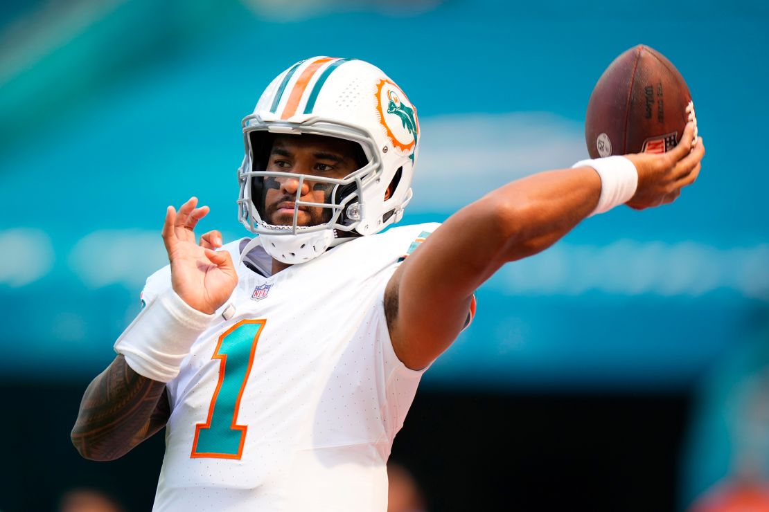 MIAMI GARDENS, FLORIDA - OCTOBER 29: Tua Tagovailoa #1 of the Miami Dolphins warms up prior to a game against the New England Patriots at Hard Rock Stadium on October 29, 2023 in Miami Gardens, Florida. (Photo by Rich Storry/Getty Images)