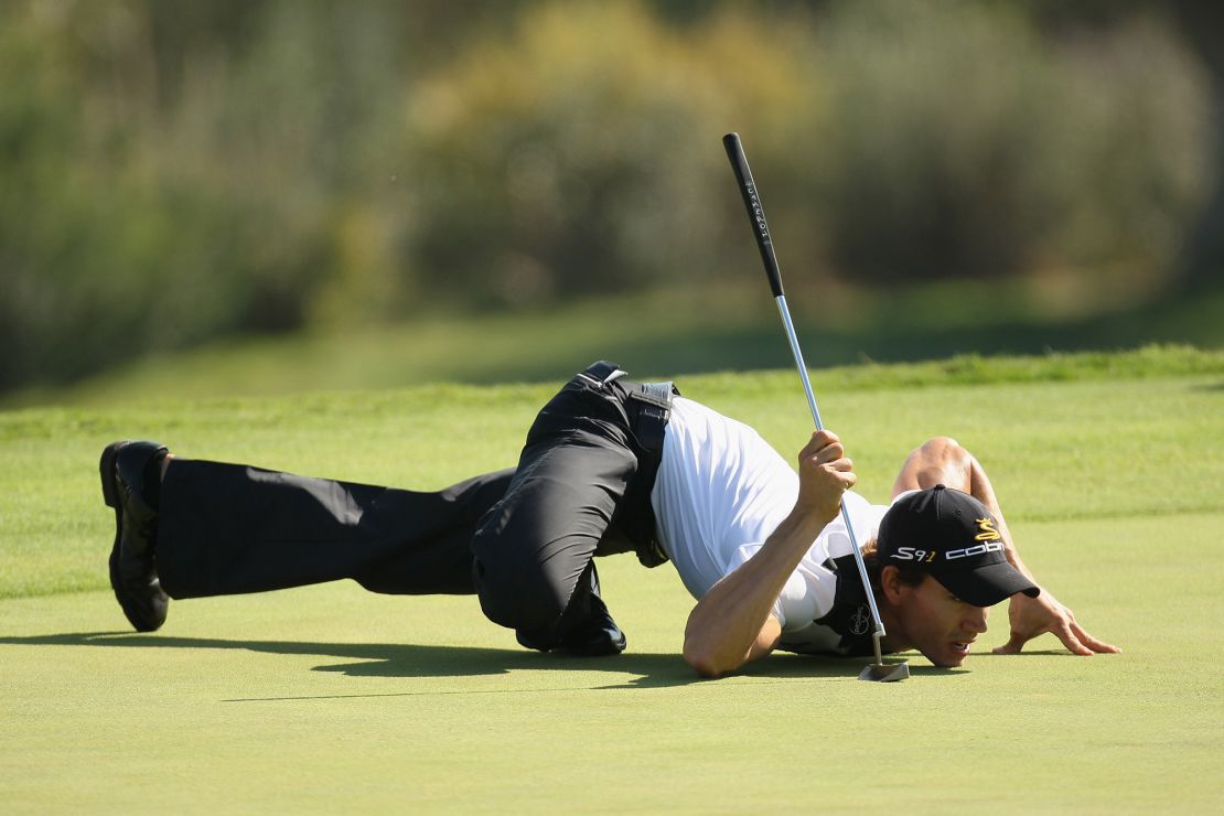 CASARES, SPAIN - OCTOBER 30:  Camilo Villegas of Colombia lines up a putt on the 18th green during Day Two of the Group Stage of the Volvo World Match Play Championship at Finca Cortesin on October 30, 2009 in Casares, Spain.  (Photo by Ross Kinnaird/Getty Images)