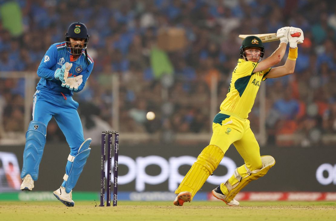 AHMEDABAD, INDIA - NOVEMBER 19: Marnus Labuschagne of Australia plays a shot as KL Rahul of India keeps during the ICC Men's Cricket World Cup India 2023 Final between India and Australia at Narendra Modi Stadium on November 19, 2023 in Ahmedabad, India. (Photo by Robert Cianflone/Getty Images)