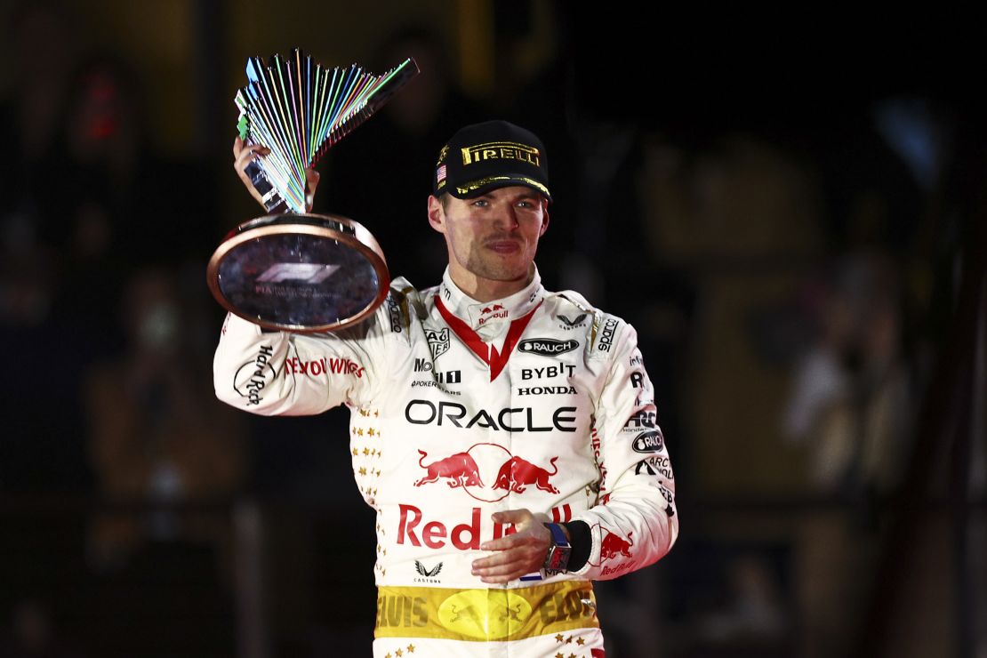 LAS VEGAS, NEVADA - NOVEMBER 18: Race winner Max Verstappen of the Netherlands and Oracle Red Bull Racing celebrates on the podium during the F1 Grand Prix of Las Vegas at Las Vegas Strip Circuit on November 18, 2023 in Las Vegas, Nevada. (Photo by Jared C. Tilton/Getty Images)