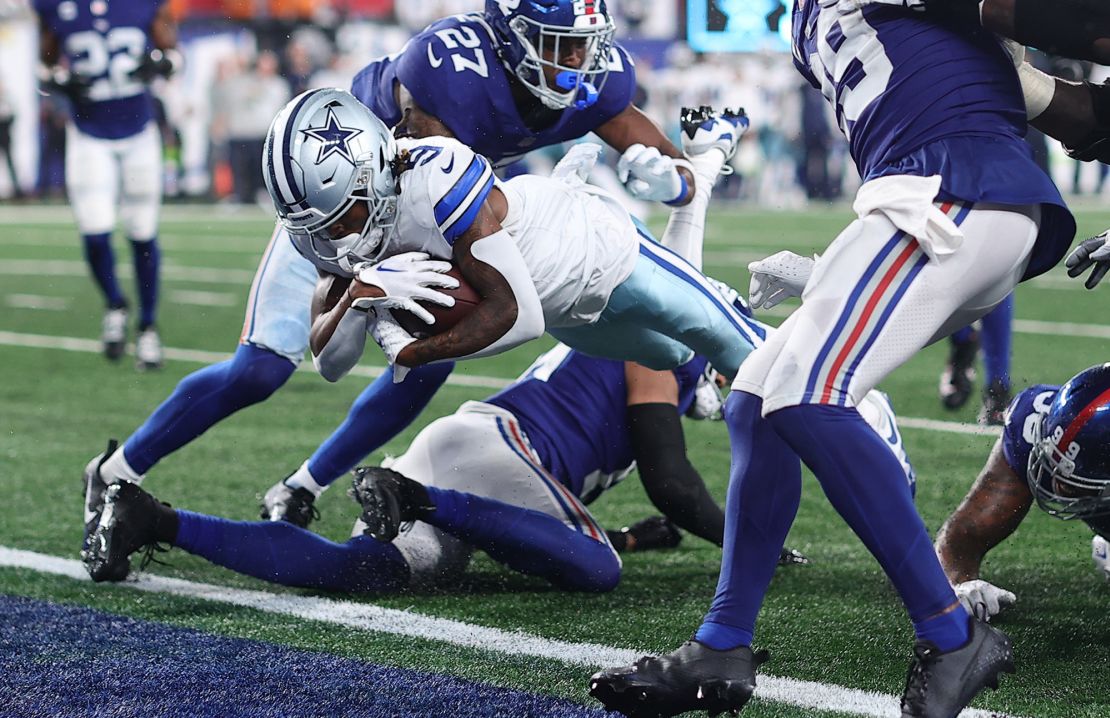 EAST RUTHERFORD, NEW JERSEY - SEPTEMBER 10: KaVontae Turpin #9 of the Dallas Cowboys rushes for a touchdown during the fourth quarter against the New York Giants at MetLife Stadium on September 10, 2023 in East Rutherford, New Jersey. (Photo by Tim Nwachukwu/Getty Images)