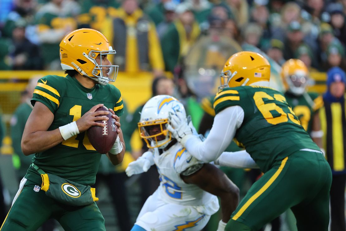 GREEN BAY, WISCONSIN - NOVEMBER 19: Jordan Love #10 of the Green Bay Packers drops back to pass during a game against the Los Angeles Chargers at Lambeau Field on November 19, 2023 in Green Bay, Wisconsin. The Packers defeated the Chargers 23-20. (Photo by Stacy Revere/Getty Images)