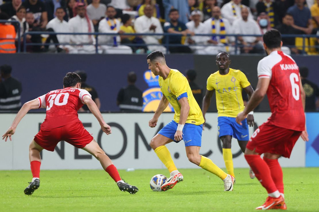 Persepolis' Georgian defender #30 Giorgi Gvelesiani marks Nassr's Portuguese forward #07 Cristiano Ronaldo during the AFC Champions League Group E football match between Saudi's al-Nassr and Iran's Persepolis at the Al-Awwal Stadium in Riyadh on November 27, 2023. (Photo by Fayez NURELDINE / AFP) (Photo by FAYEZ NURELDINE/AFP via Getty Images)