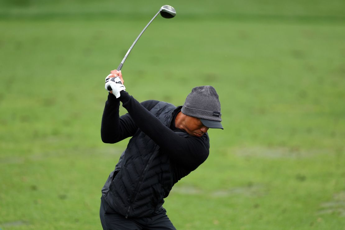 AUGUSTA, GEORGIA - APRIL 08: Tiger Woods of the United States warms up on the practice area during the third round of the 2023 Masters Tournament at Augusta National Golf Club on April 08, 2023 in Augusta, Georgia. (Photo by Andrew Redington/Getty Images)