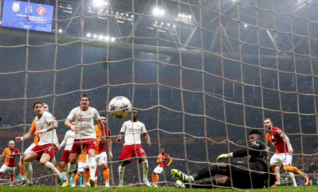 Soccer Football - Champions League - Group A - Galatasaray v Manchester United - RAMS Park, Istanbul, Turkey - November 29, 2023
Galatasaray's Hakim Ziyech scores their second goal past Manchester United's Andre Onana REUTERS/Murad Sezer     TPX IMAGES OF THE DAY