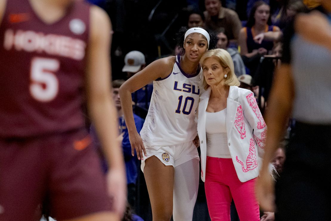 Nov 30, 2023; Baton Rouge, Louisiana, USA; LSU Lady Tigers forward Angel Reese (10) talks to LSU Lady Tigers head coach Kim Mulkey during the first half against the Virginia Tech Hokies at Pete Maravich Assembly Center. Mandatory Credit: Matthew Hinton-USA TODAY Sports