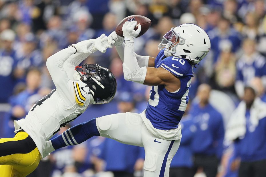 Indianapolis Colts safety Nick Cross intercepts a pass intended for Pittsburgh Steelers wide receiver George Pickens. The Colts beat the Steelers 30-13.