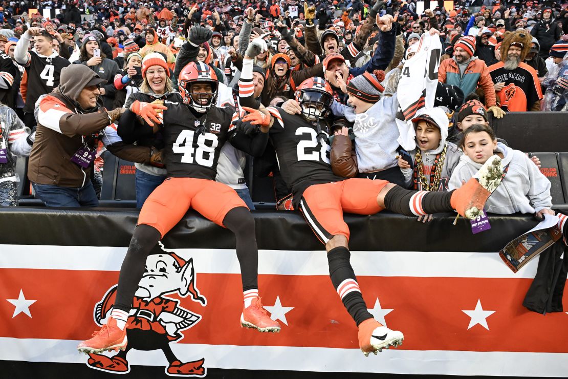 CLEVELAND, OHIO - DECEMBER 17: Tanner McCalister #48 and Mike Ford #28 of the Cleveland Browns celebrate after a fourth quarter interception to win 20-17 over the Chicago Bears at Cleveland Browns Stadium on December 17, 2023 in Cleveland, Ohio. (Photo by Nick Cammett/Getty Images)