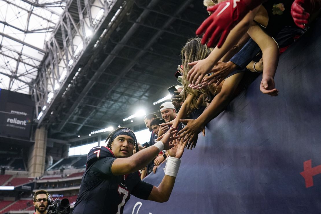 Stroud celebrates with fans after the Texans beat the Buccaneers.