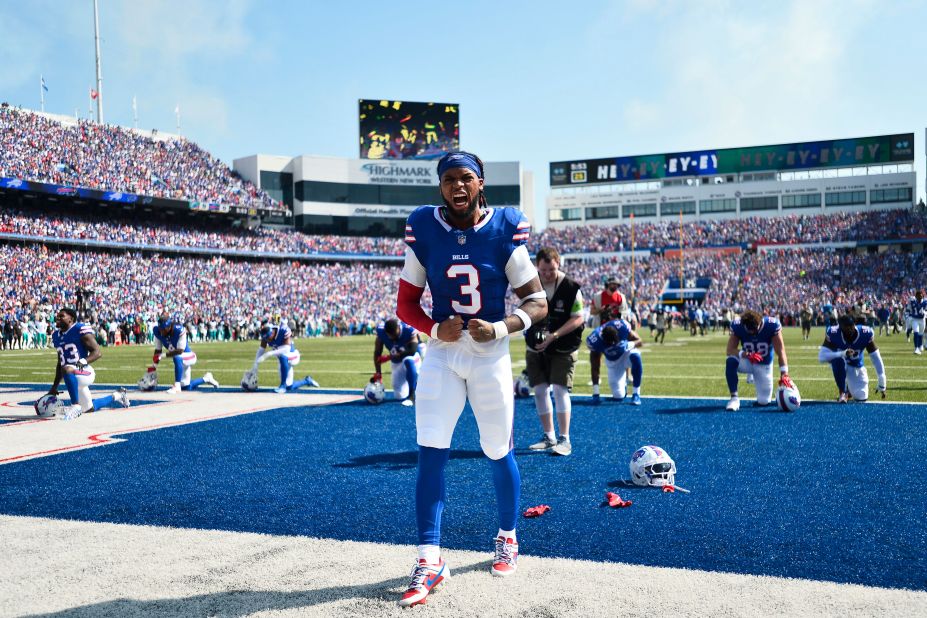 Buffalo Bills safety Damar Hamlin shouts while warming up ahead of the Bills game against the Miami Dolphins on October 1. Hamlin participated in the opening kickoff, his first regular season appearance after surviving a cardiac arrest on the field nearly nine months ago. The Bills beat the Dolphins 48-20.