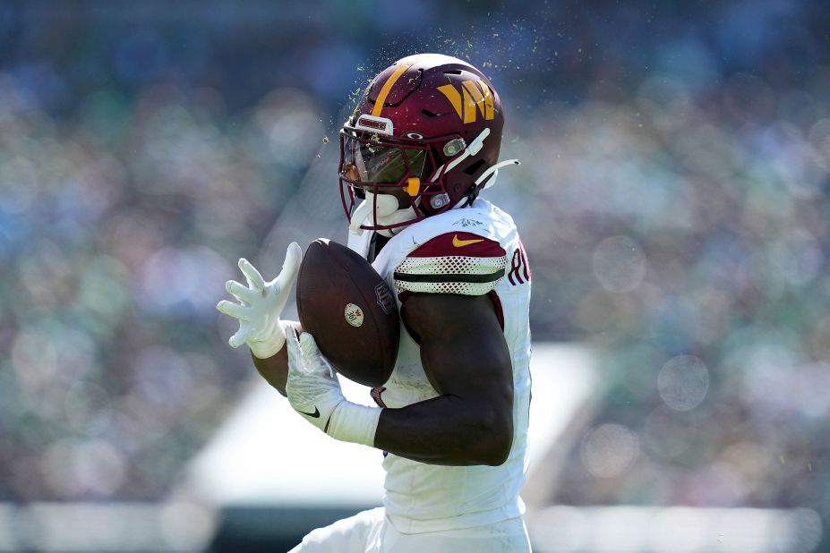 Brian Robinson Jr. of the Washington Commanders makes a pass reception during the second quarter of the Commanders' 34-31 overtime loss to the Philadelphia Eagles.