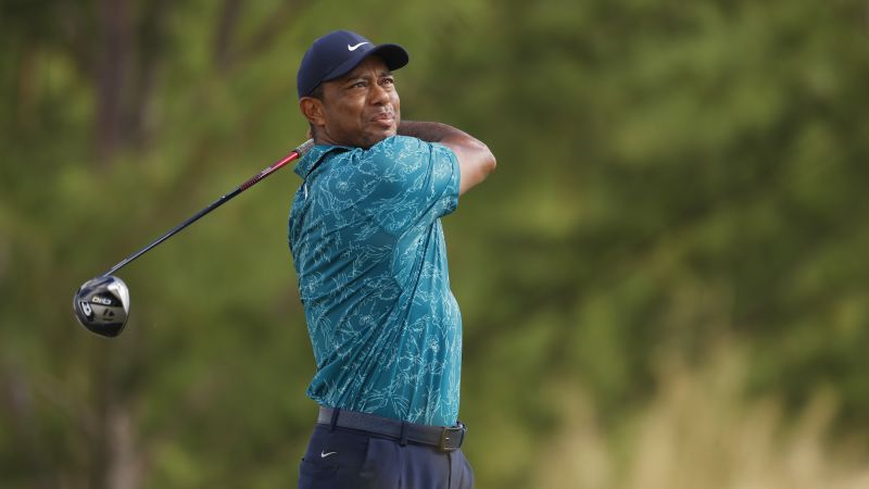 Tiger Woods improves on day two of his long-awaited return to golf