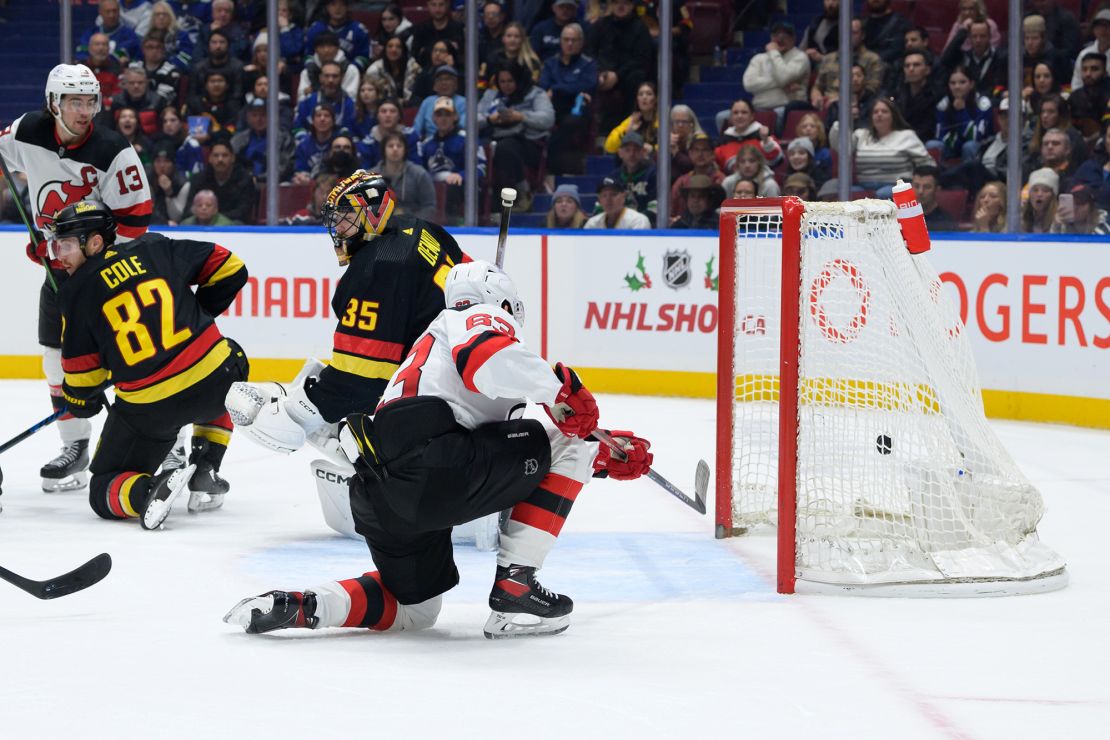 VANCOUVER, CANADA - DECEMBER 5: Jesper Bratt #63 of the New Jersey Devils scores the game-winning goal against Thatcher Demko #35 of the Vancouver Canucks during the third period of their NHL game at Rogers Arena on December 5, 2023 in Vancouver, British Columbia, Canada. (Photo by Derek Cain/Getty Images)