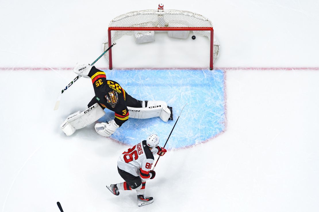 VANCOUVER, CANADA - DECEMBER 5: Jack Hughes #86 of the New Jersey Devils scores a goal against Thatcher Demko #35 of the Vancouver Canucks during the first period of their NHL game at Rogers Arena on December 5, 2023 in Vancouver, British Columbia, Canada. (Photo by Derek Cain/Getty Images)